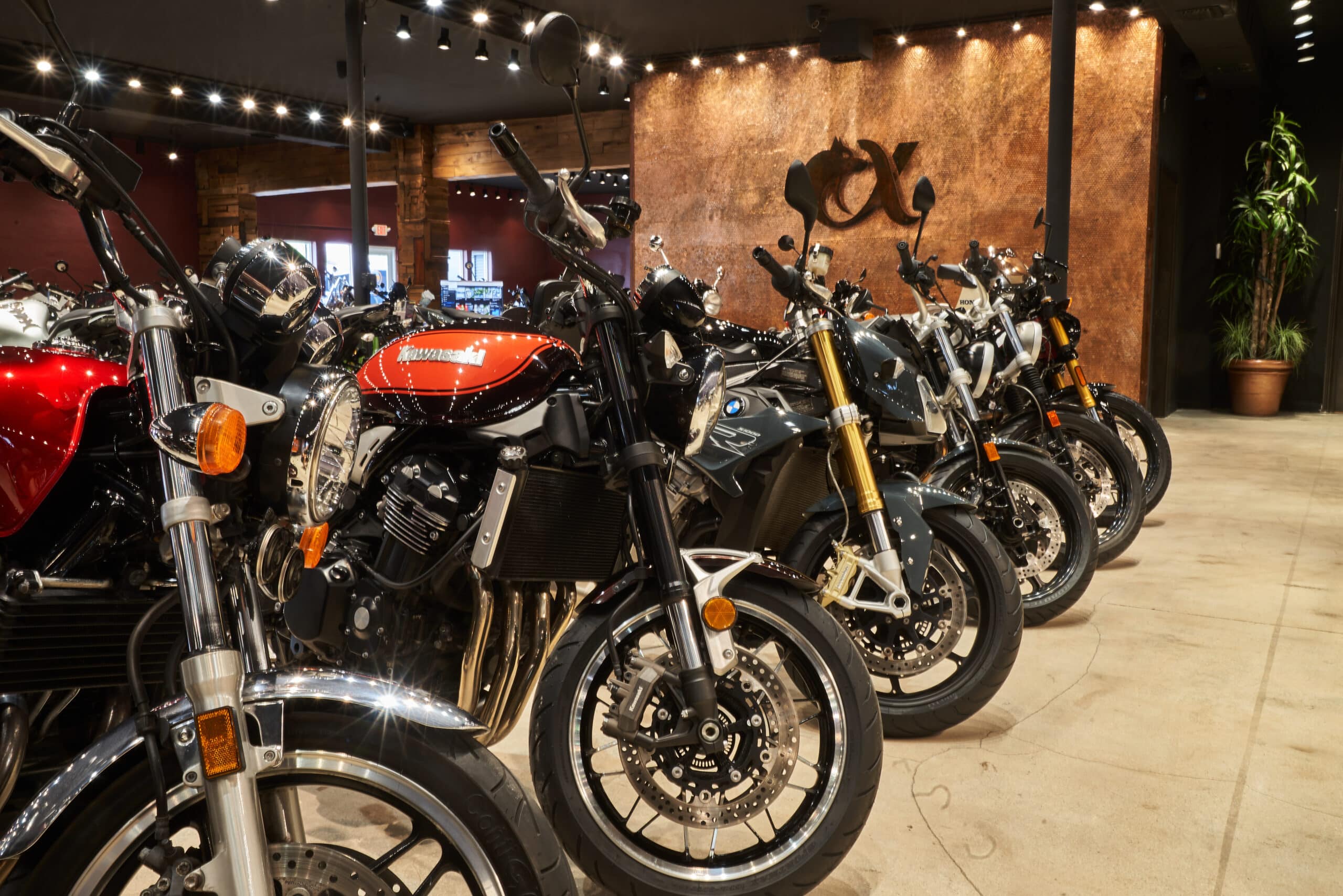 alpha cycles show room with rows of bikes for motorcycle financing